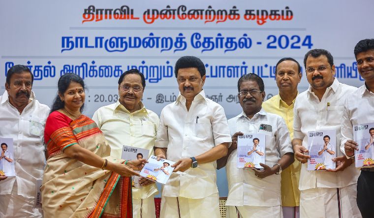 Tamil Nadu Chief Minister and Dravida Munnetra Kazhagam (DMK) chief MK Stalin with party leaders TR Baalu, Kanimozhi and others releases the party's candidates' list and manifesto during a party meeting, in Chennai, Wednesday, March 20, 2024